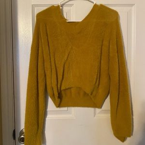 Super cute yellow sweater!